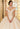 This Valentina Collection dress is available in champagne and purple.