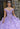 This Vizcaya Collection dress is available in champagne, purple, and red.