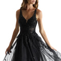 Tulle A-line prom dress with v-neckline and strappy, corset back.