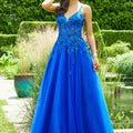 Tulle A-line prom dress with v-neckline and strappy, corset back.