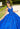 This Valencia Collection quinceañera dress is available in red and blue.