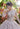 A Morilee Vizcaya Quinceañera Dress. Available in purple, pink, and gold.