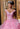 This Vizcaya Collection dress is available in purple, pink, and yellow.