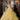 This Vizcaya Collection dress is available in purple, pink, and yellow.