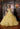This Vizcaya Collection dress is available in purple, pink, and yellow.