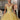 This Vizcaya Collection dress is available in purple, pink, and yellow.