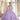 This Vizcaya Collection dress is available in purple, pink, and yellow.