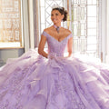 This Vizcaya Collection dress is available in purple, pink, and yellow.