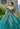 This Vizcaya Collection dress is available in pink, green, and red.