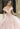 This Vizcaya Collection dress is available in pink, green, and red.