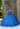 This Vizcaya Collection dress is available in blue, red, and green.